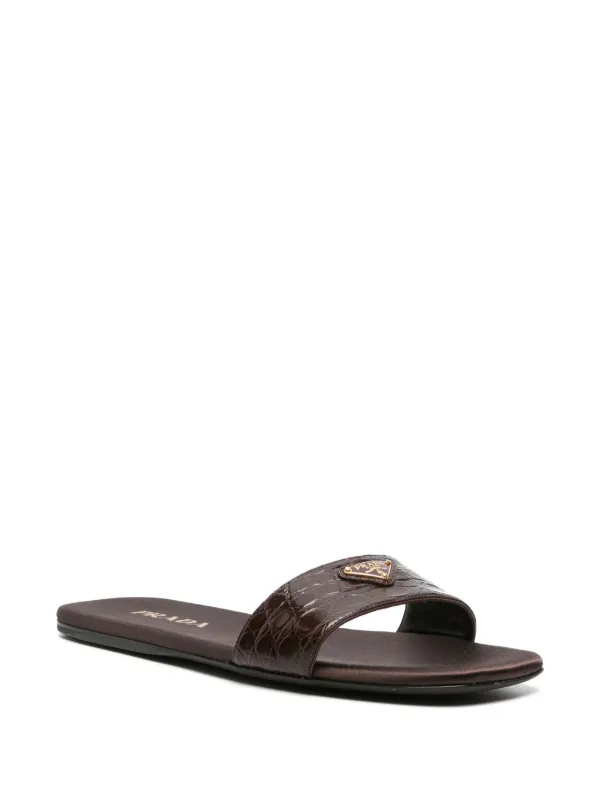 Prada triangle-logo embossed-crocodile Slides | Brown