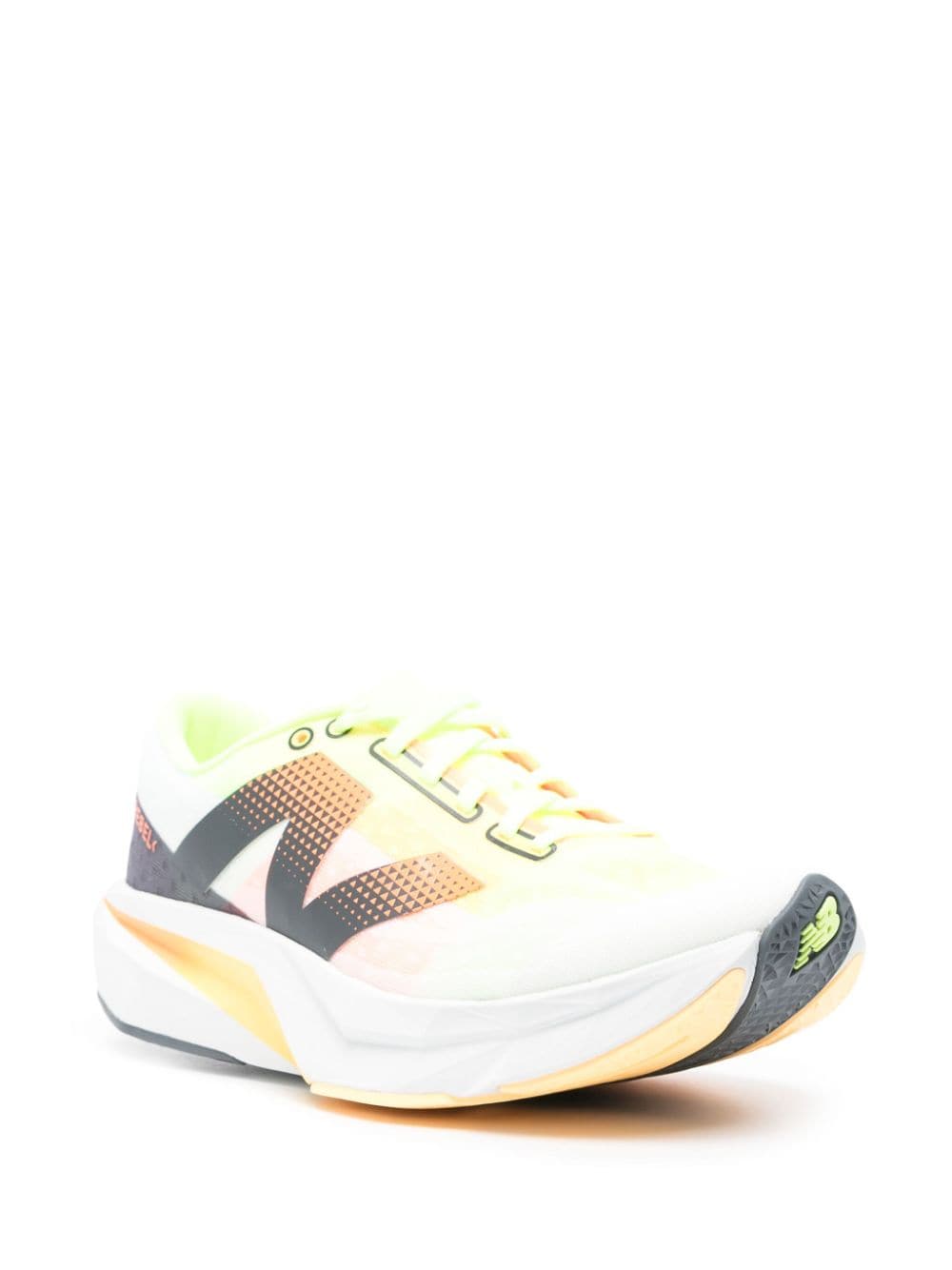 Shop New Balance Fuelcell Rebel V4 Running Sneakers In White