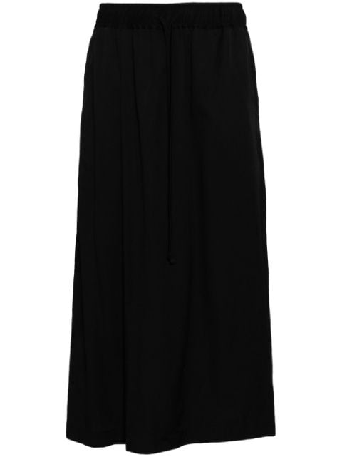 Julius loose fit pleated trousers