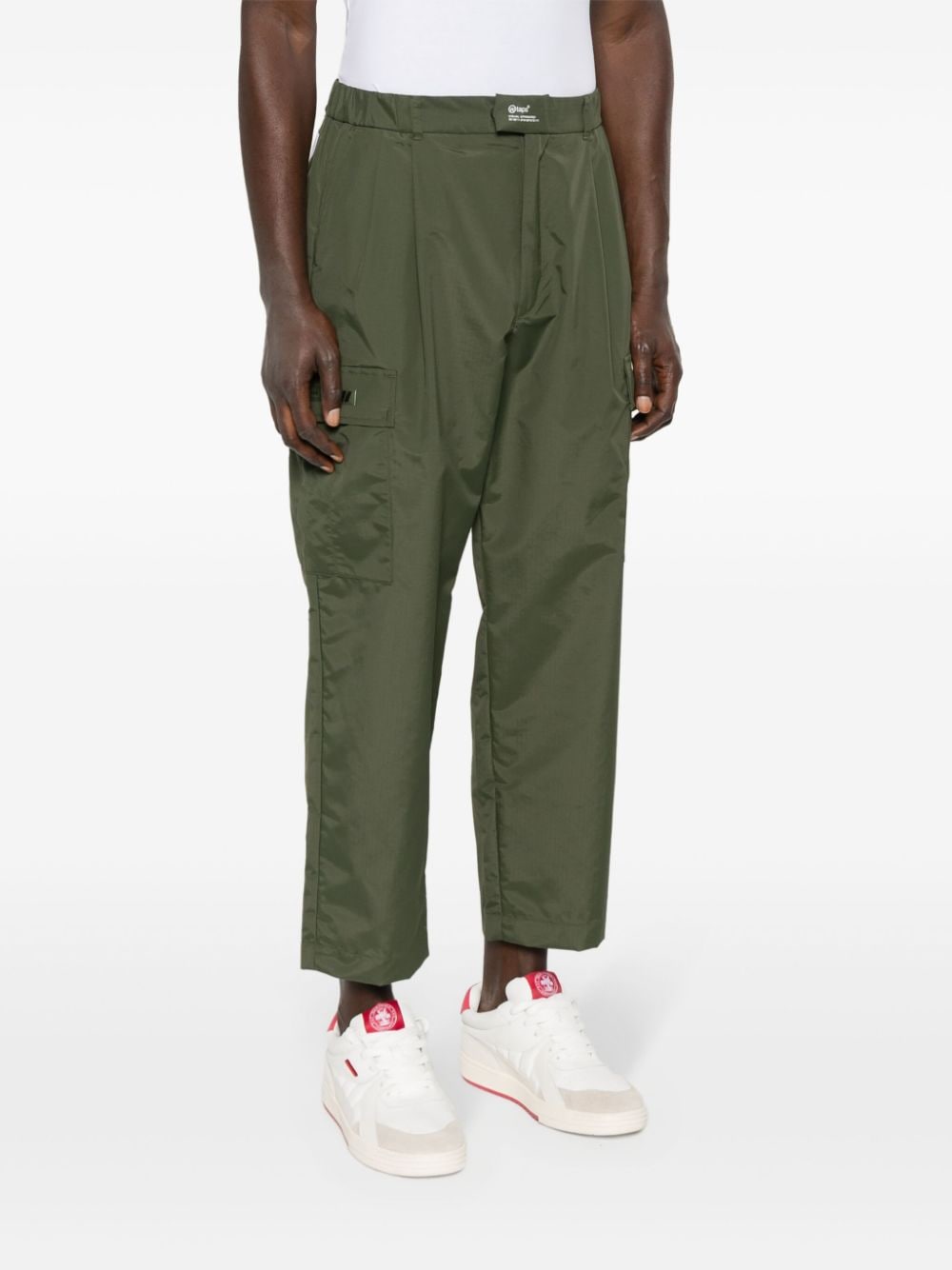 Shop Wtaps Tapered Ripstop Cargo Trousers In Green