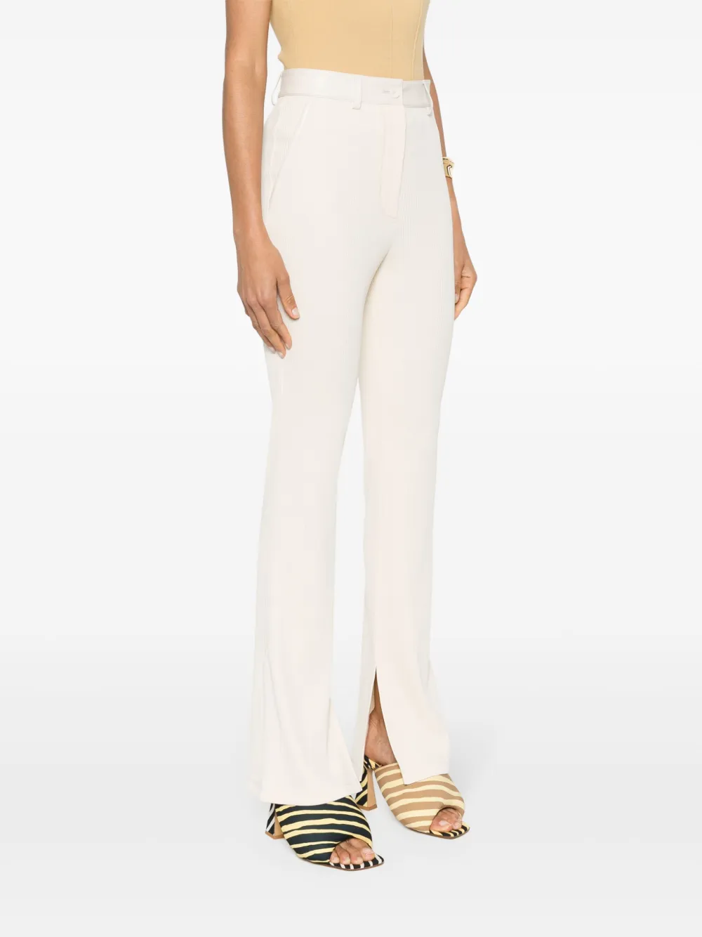 Shop Nanushka Fine-ribbed Bootcut Trousers In Neutrals