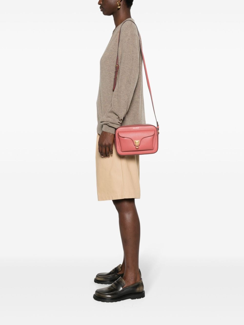 Shop Coccinelle Small Beat Crossbody Bag In Pink