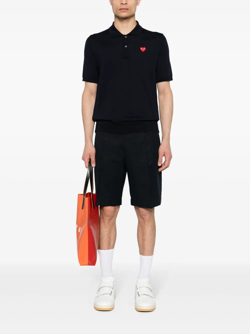 Comme Des Garçons Play logo-patch knitted polo shirt - Blauw