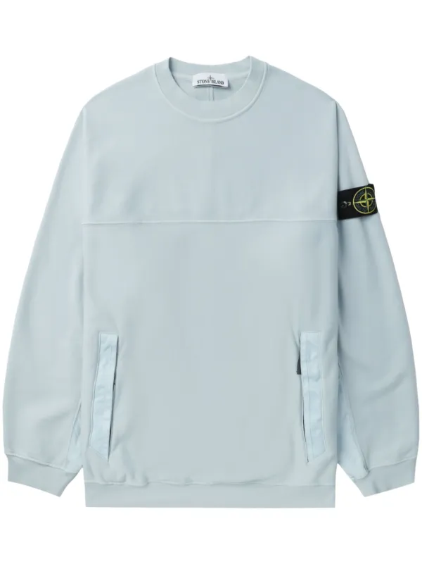 Light blue stone island sweatshirt on sale