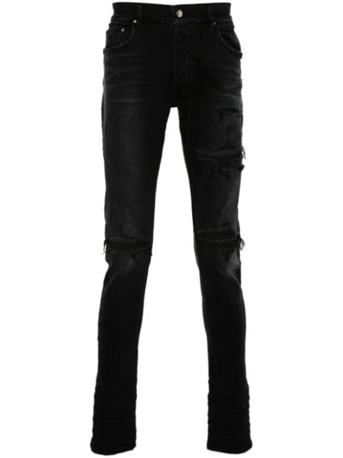 AMIRI logo-patch cotton jeans