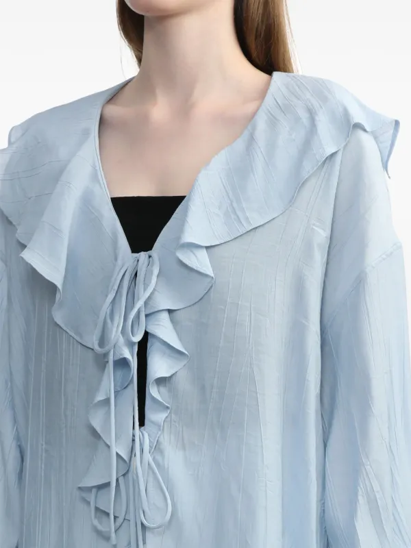 light blue ruffle blouse