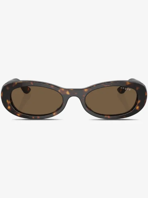 Vogue Eyewear lentes de sol con armazón ovalada estilo carey