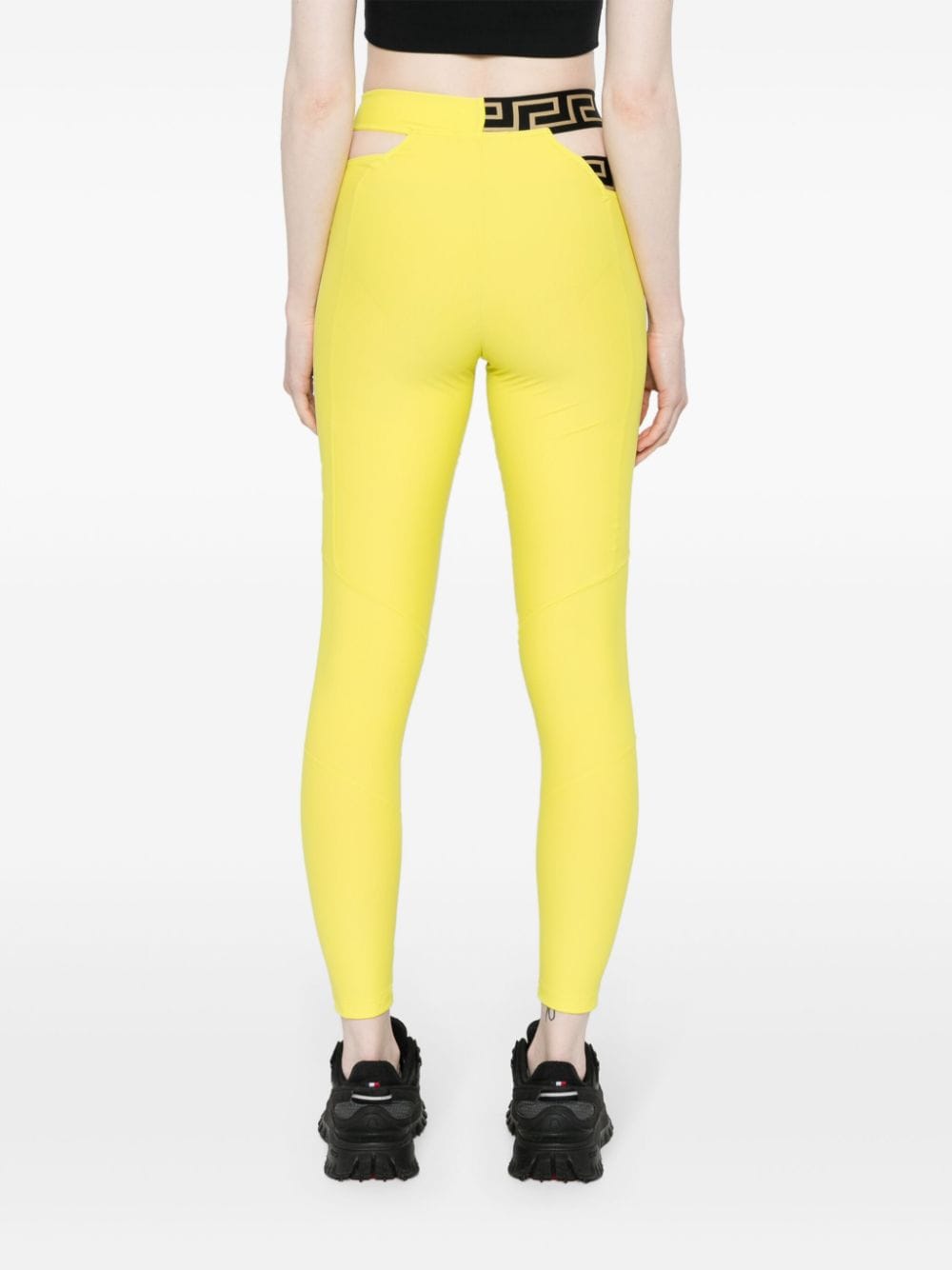 Shop Versace La Greca Crossover Waistband Leggings In Yellow