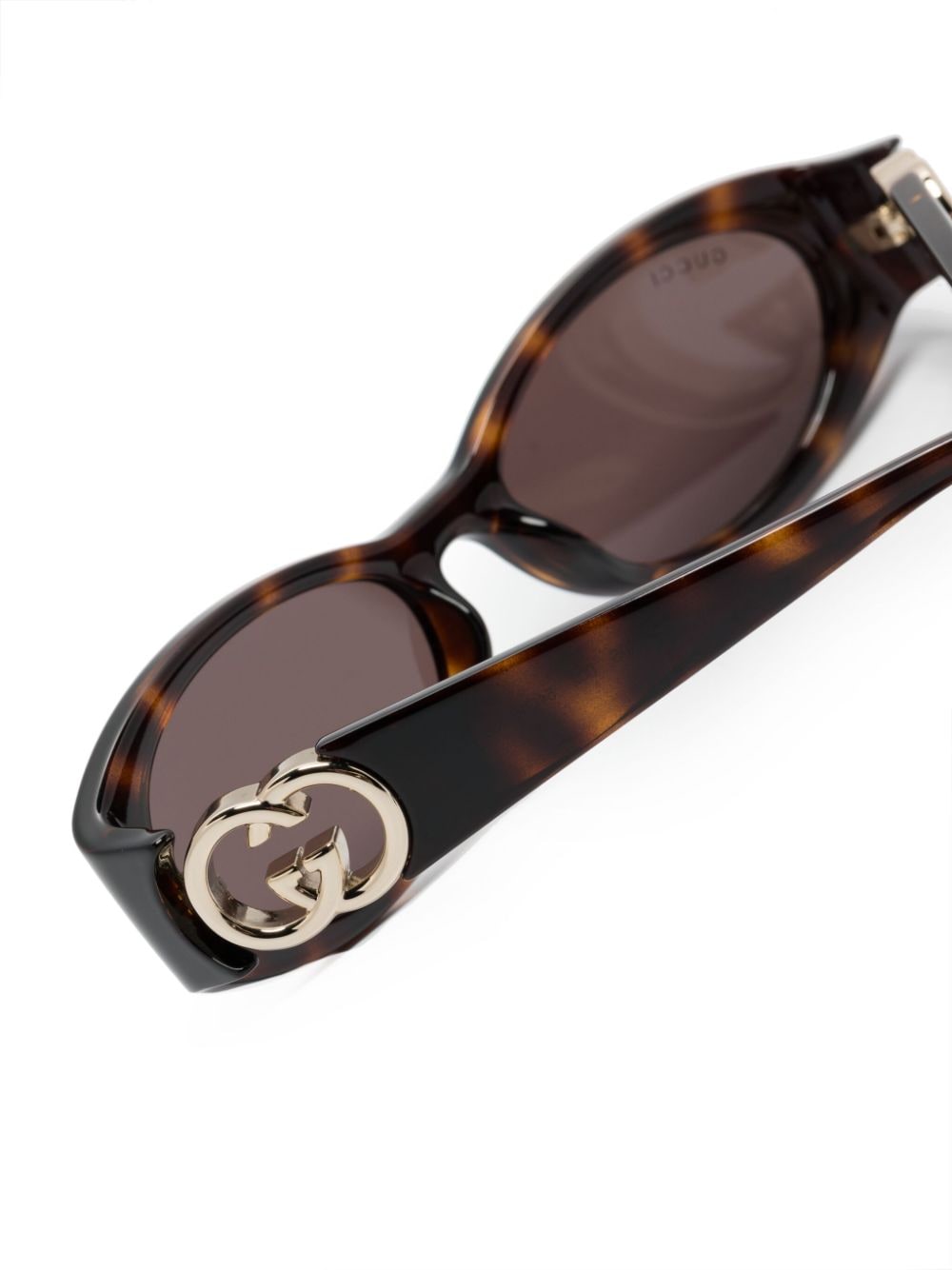 Gucci Eyewear Zonnebril met ovalen montuur Bruin