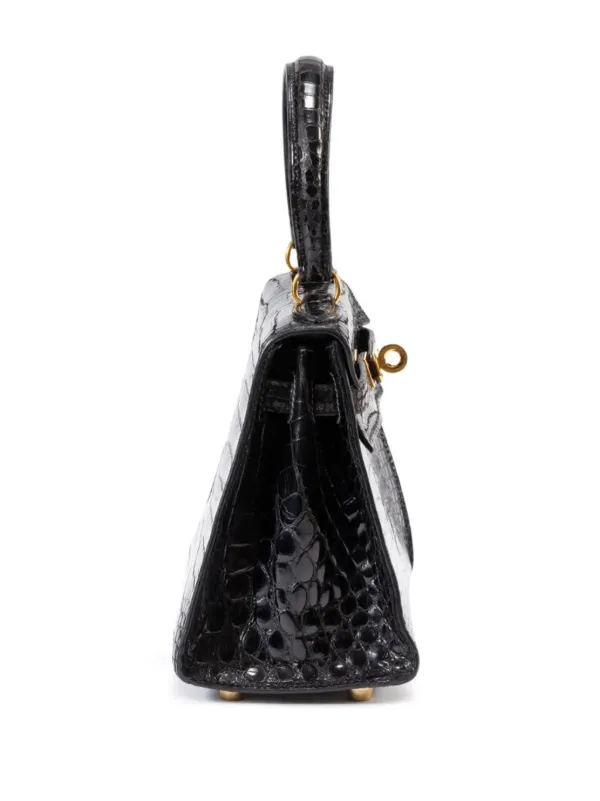 Hermès Pre-Owned 1992 Kelly two-way Handbag | Black | FARFETCH Hermès Pre-Owned 1992 Kelly two-way Handbag | Black | FARFETCH