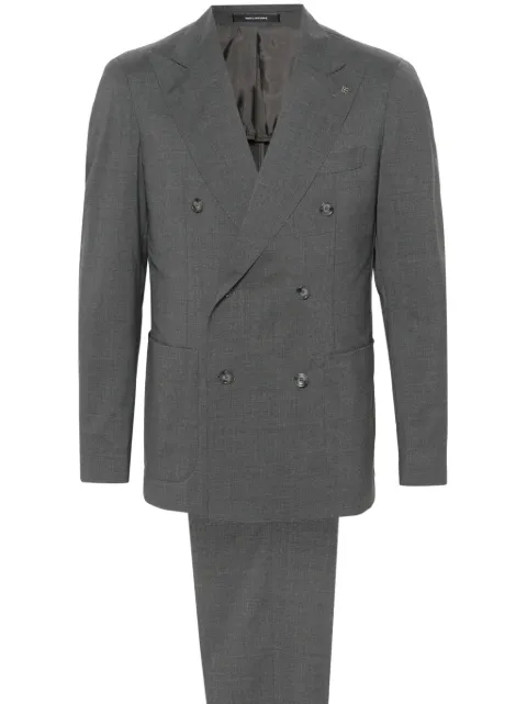 Tagliatore traje con doble botonadura