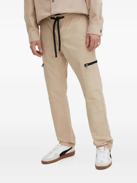 HUGO pantalones con bolsillos con cierre