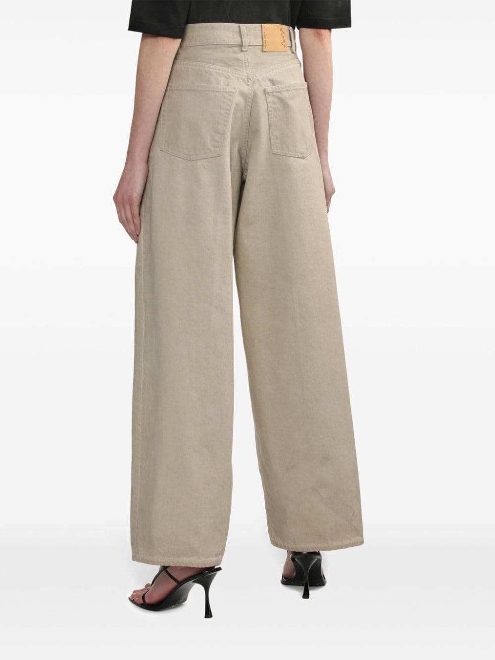 Shop Haikure High-waisted Baggy Jeans In Neutrals