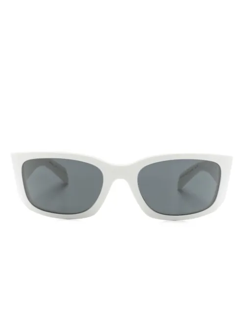 Lunettes de soleil à logo gravé - Prada Eyewear - Modalova