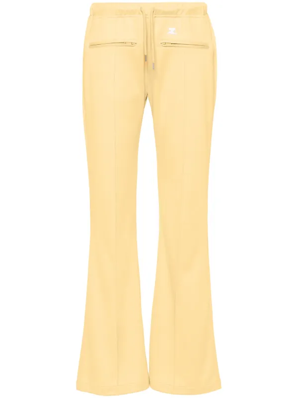 Courrèges Logo-appliqué Wide Trousers in Yellow