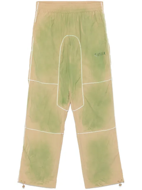 KidSuper pantalones con efecto degradado
