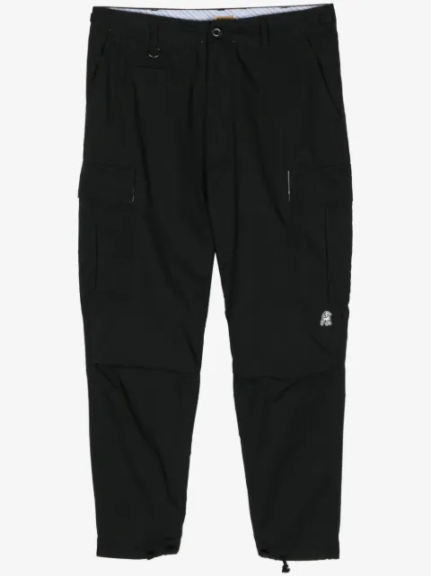 Undercover pantalones cargo con diseño ajustado