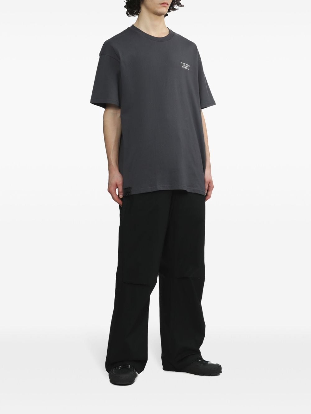 Shop Izzue Graphic-print Cotton T-shirt In Black