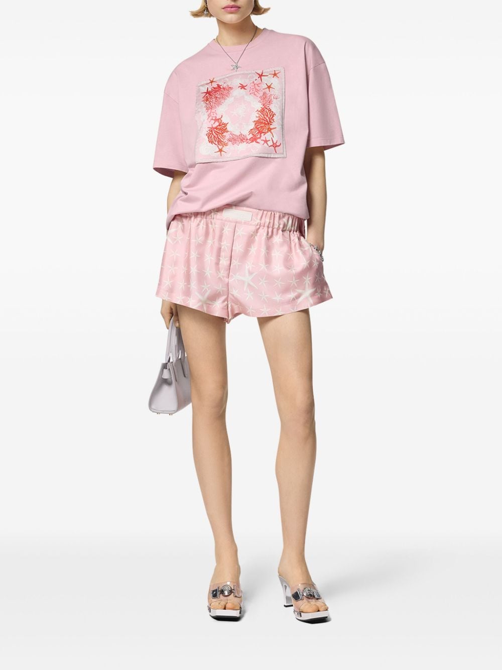 Versace T-shirt met verlaagde schouders en applicatie Roze
