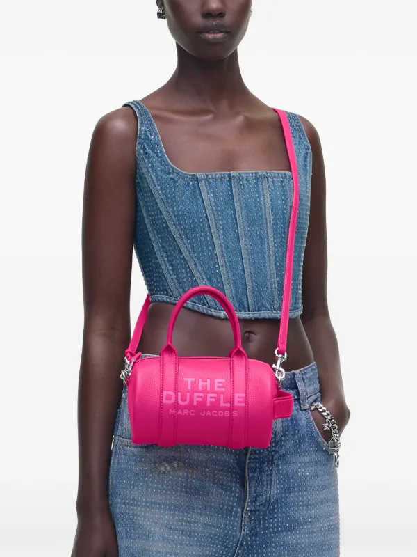 Pink mini duffle bag on sale