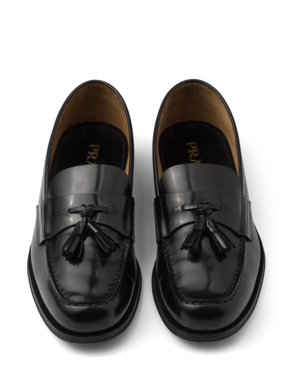 Shop Prada Tassel-detail Leather Loafers In Black