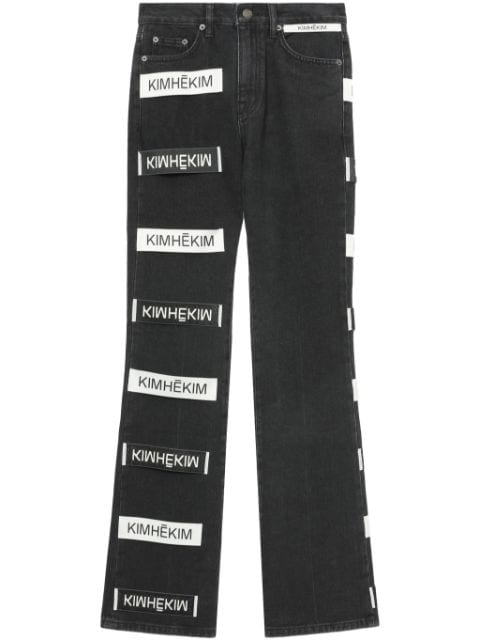 Kimhekim logo-appliqué high-rise flared jeans 