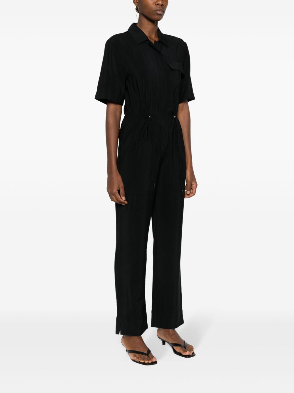 Shop Calvin Klein Textured Buttoned Jumpsuit In Black