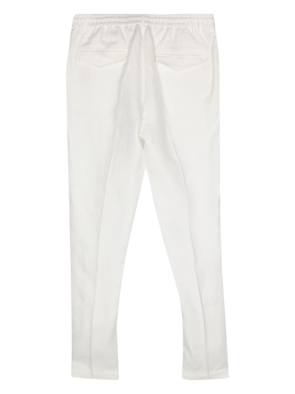 Shop Peserico Tapered Linen Trousers In White
