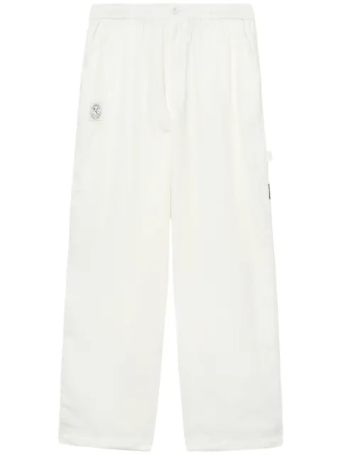 izzue logo-appliqué loose-fit trousers