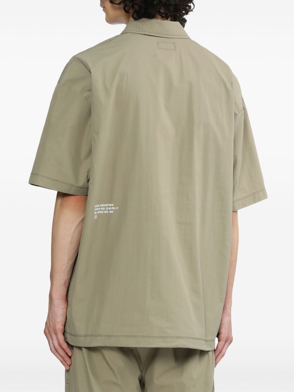 Shop Izzue Logo-appliquéd Polo Shirt In Green