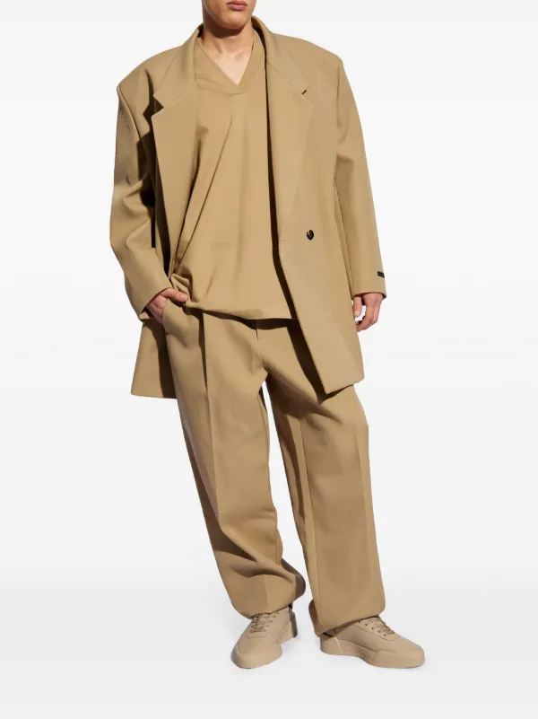 Fear Of God logo-patch Wool Trousers | Neutrals | FARFETCH