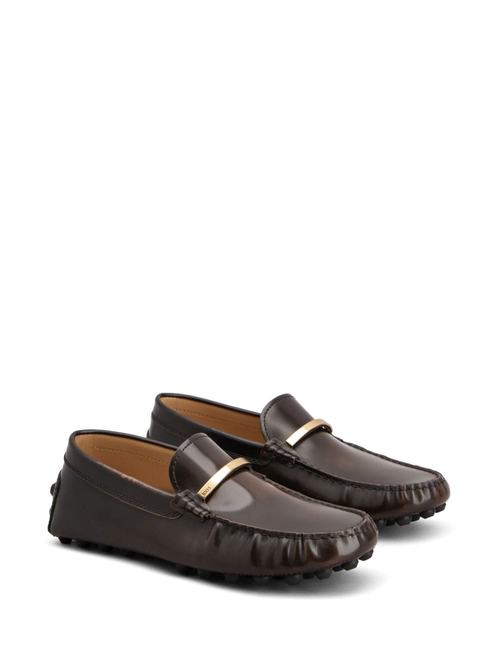 Tod's gold-tone logo engraved loafers Brown