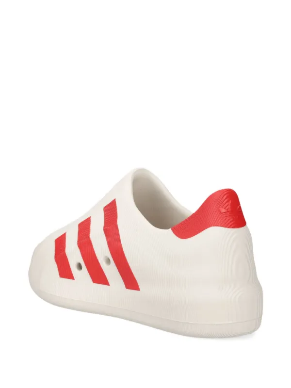 Adidas Adifoam Superstar three-stripe slip-on Sneakers | Neutrals | FARFETCH