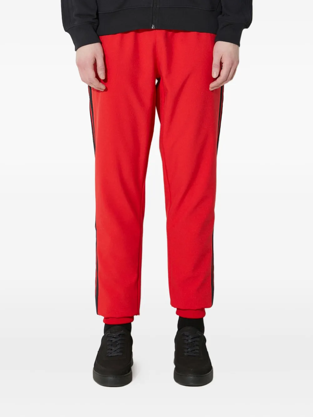 adidas three-stripe track pants | Red | Image 1