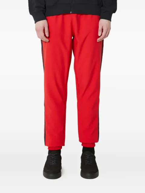 adidas three-stripe track pants