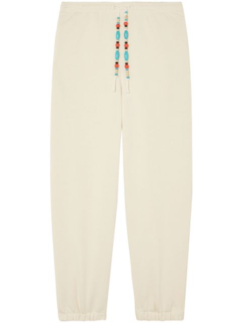 Alanui bead-embellished tapered trousers Women