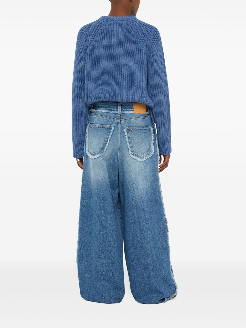 Alanui fringed wide leg jeans Women