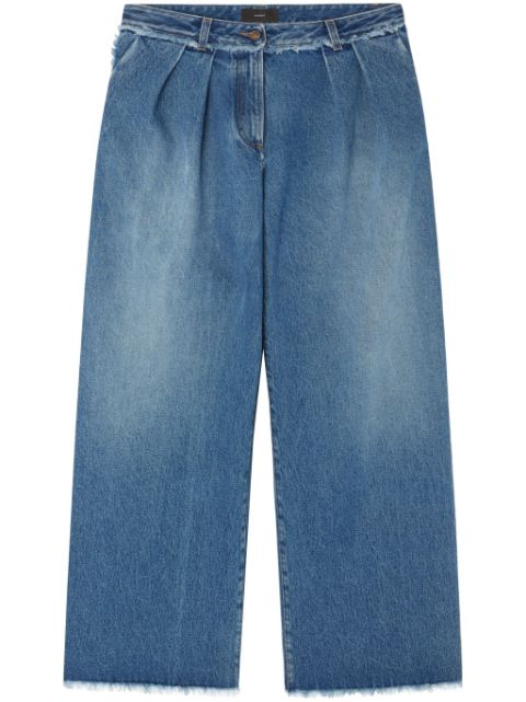 Alanui fringed wide leg jeans Women