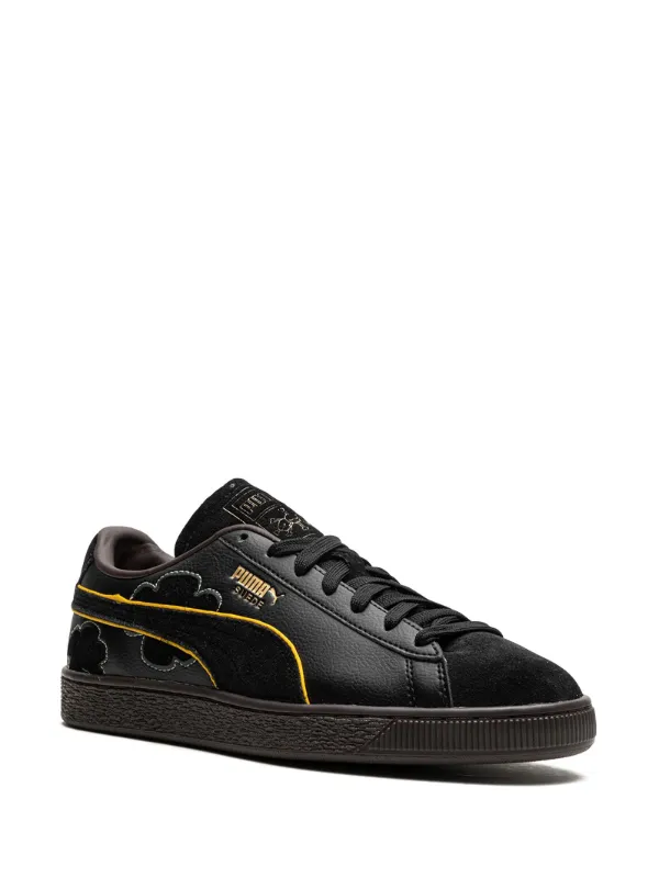 Puma suede black and gold best sale