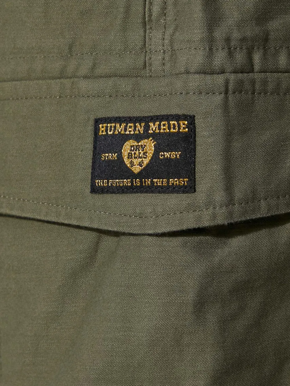 Human Made logo-patch trousers Groen