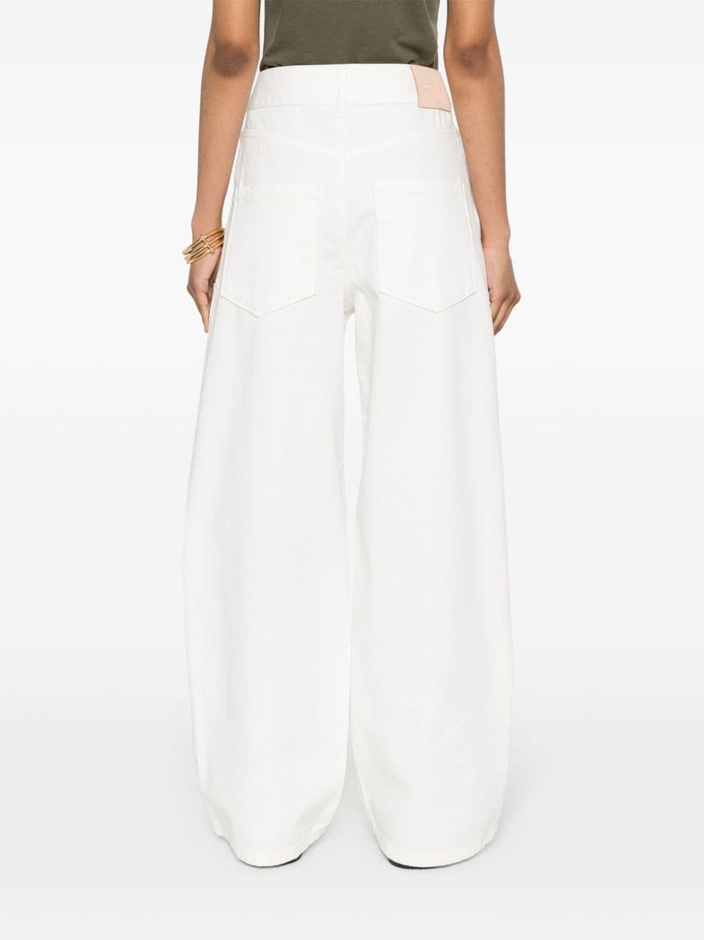 Shop Loewe Anagram Wide-leg Jeans In White