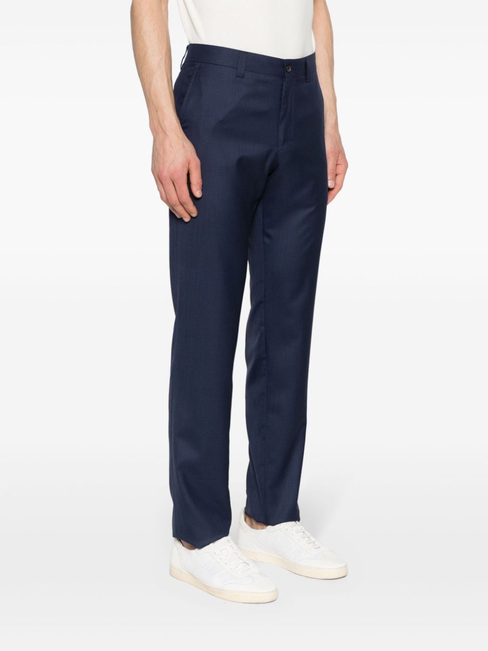 Shop Corneliani Tapered-leg Wool-blend Trousers In Blue