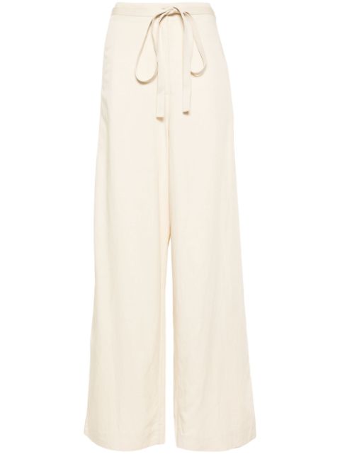 TOTEME belted-waist flared trousers 