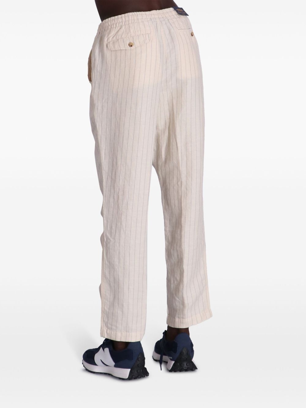 Shop Polo Ralph Lauren Pinstriped Tapered Trousers In Neutrals