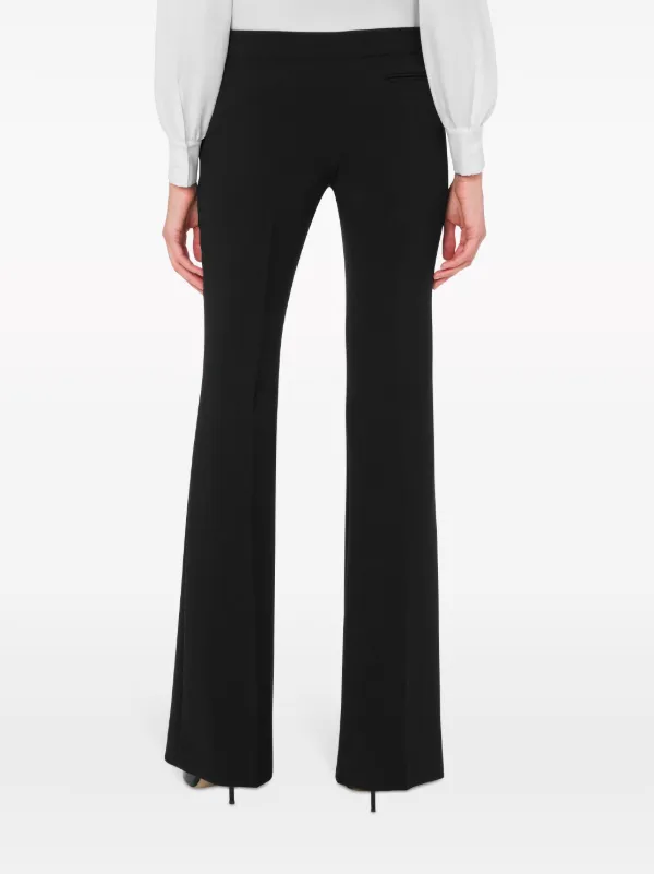 Moschino low-rise Flared Trousers | Black | FARFETCH UK