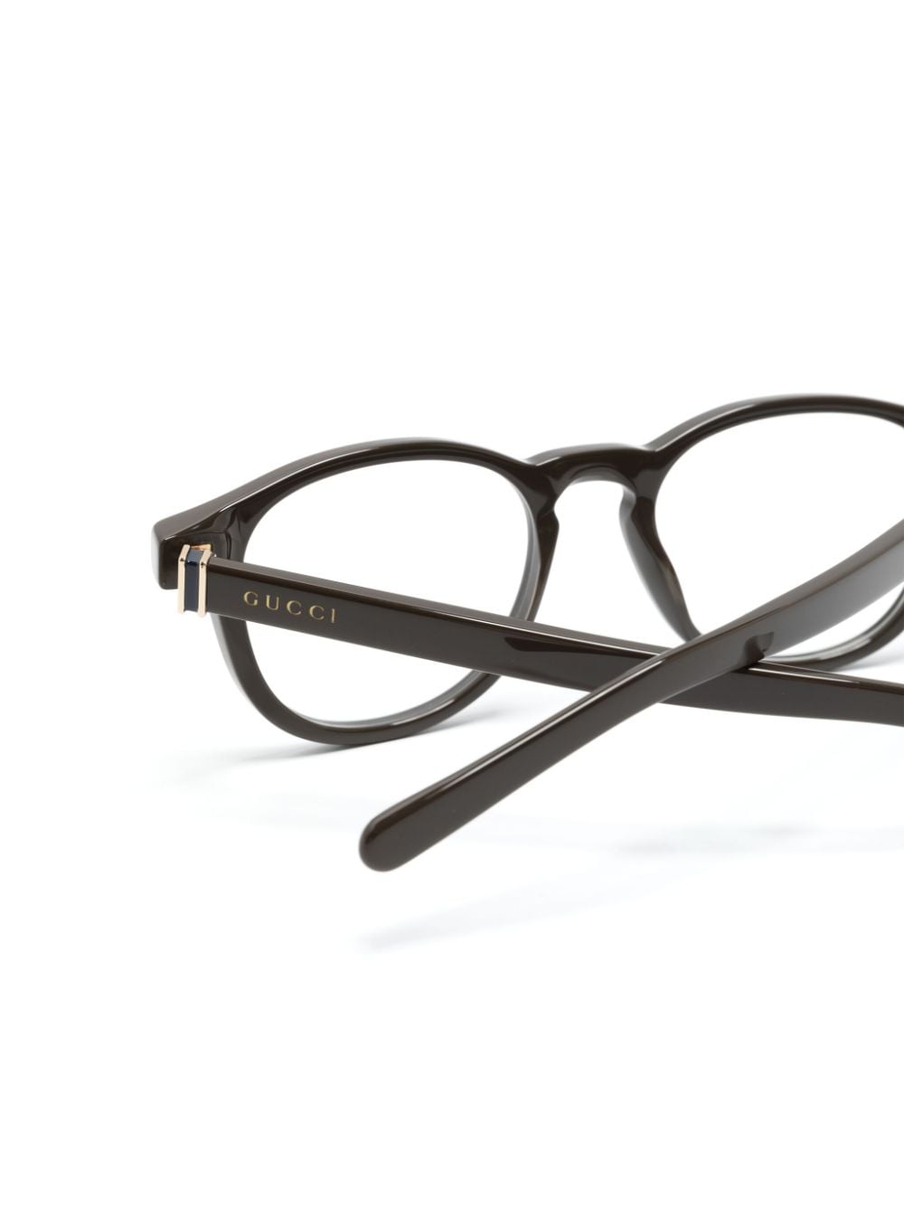 Shop Gucci Oval-frame Glasses In Brown