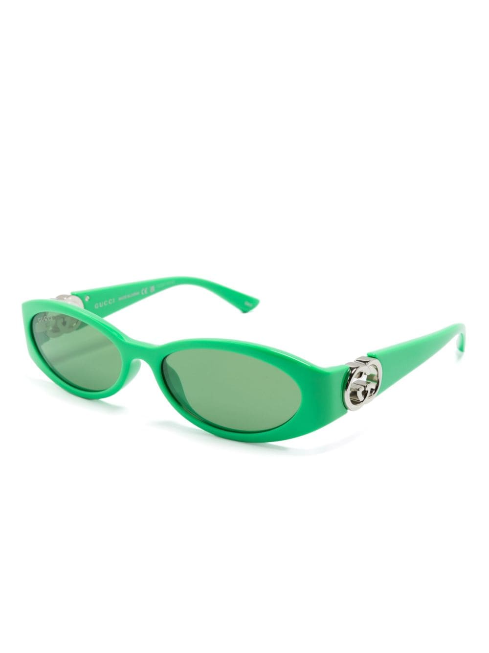 Shop Gucci Interlocking G Oval-frame Sunglasses In Green