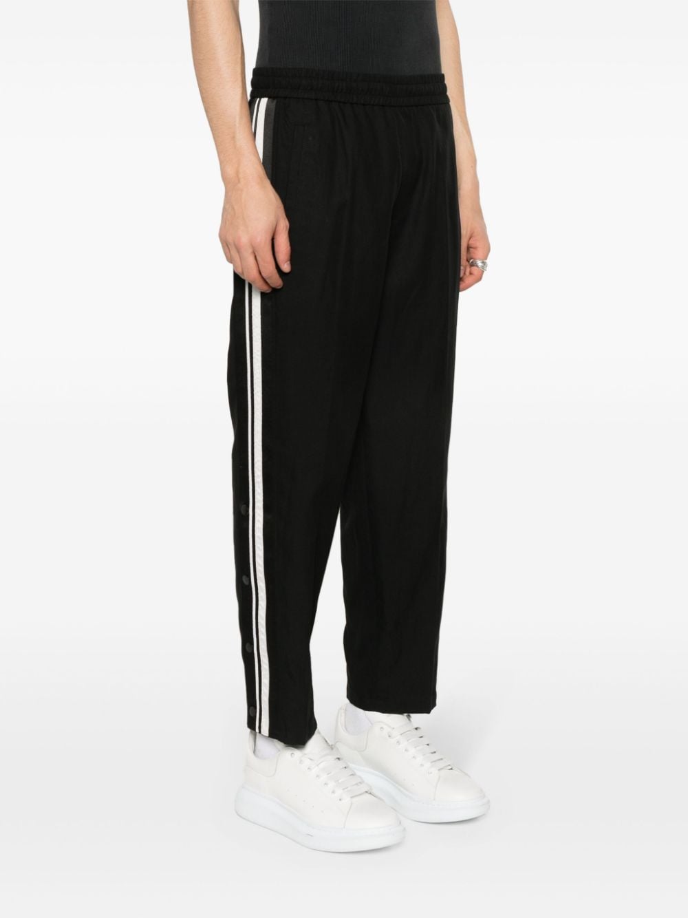 Shop Neil Barrett Tapered Track Pants In Black