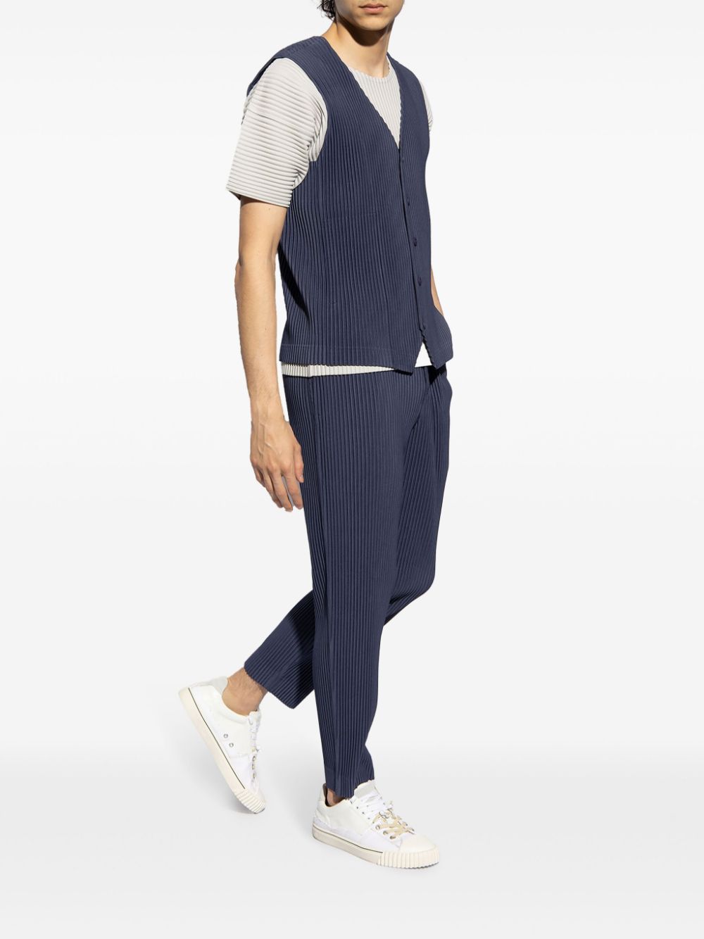 Shop Issey Miyake Plissé Tapered Trousers In Blue
