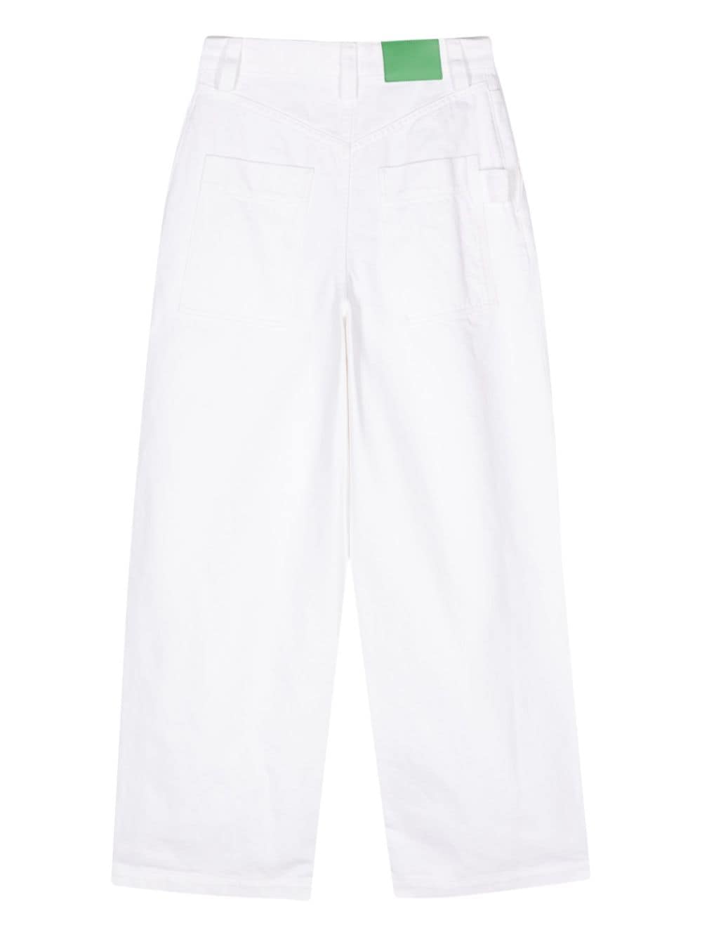 Shop Bottega Veneta Pleated Wide-leg Jeans In White
